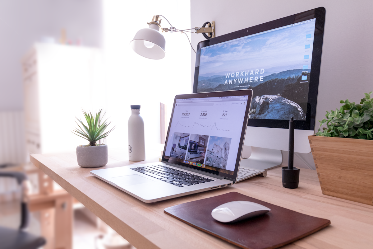 Creator overwhelmed at laptop